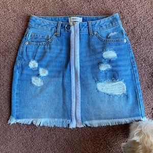 Skirt self embroidered flowers on pockets